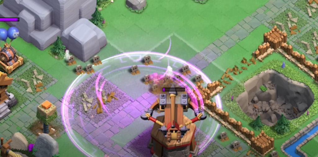Clash of Clans gameplay featuring the battlefield with an X-Bow